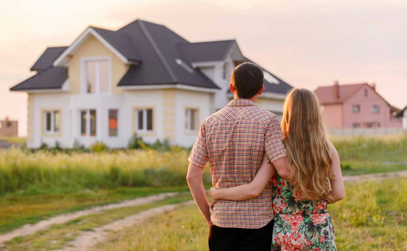 Couple Looking at New Purchased Home
