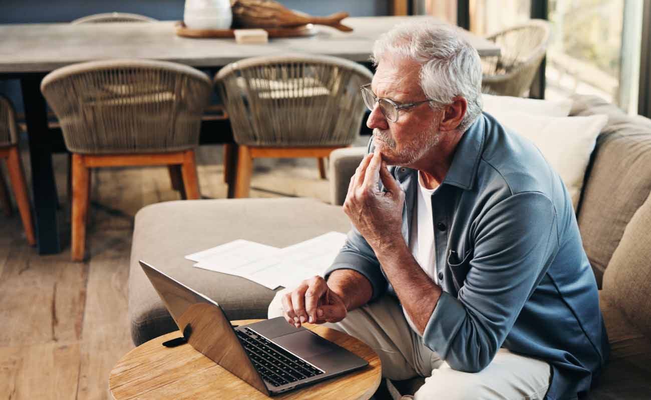 Man on his Laptop at Home Man on his Laptop at Home