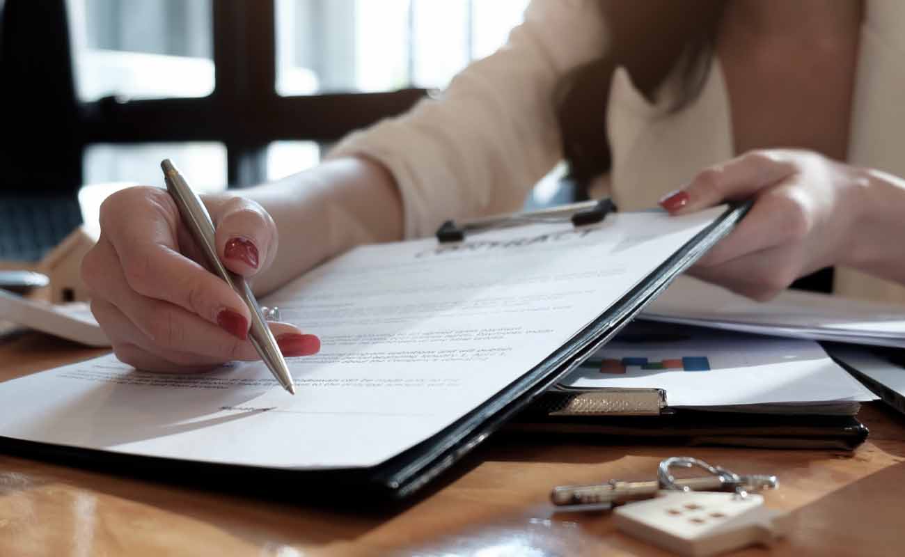 Attorney Reviewing Document with Client